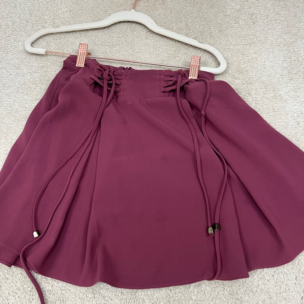 Every burgundy/maroon mini flare skirt with cute ties on top